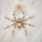 Elegant handmade beaded spider in golden hues with sparkling amber and clear crystal beads